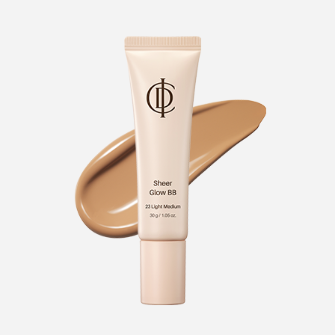 A squeeze tube of ICD Sheer Glow BB in shade 23 Light Medium, shown with a matching liquid makeup swatch behind it on a light gray background.