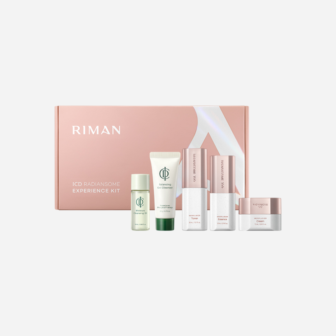 Riman 100 Radiansome Experience Kit featuring a pink gift box and five cosmetic products including a serum, lotion, and cream, arranged on a light gray background.