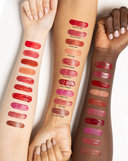 Three arms with different skin tones display vertical rows of lipstick swatches with printed shade names, photographed on a clean white background.